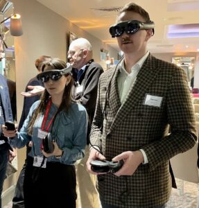 Two people wearing VR headsets at the demonstration of BrainLab work at the Oxford Hospitals Charity event