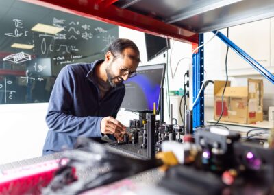 A man works on an experiment in a lab at the Wood Centre for Innovation.