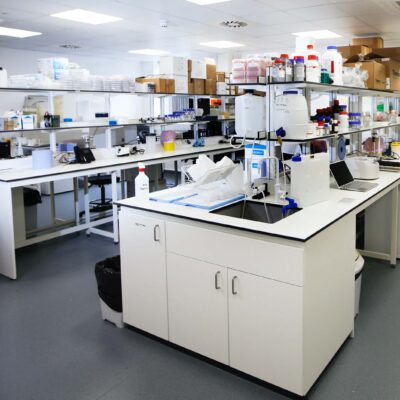 A view of one of the labs at the Wood Centre for Innovation with workspaces and shelves full of scientific equipment.
