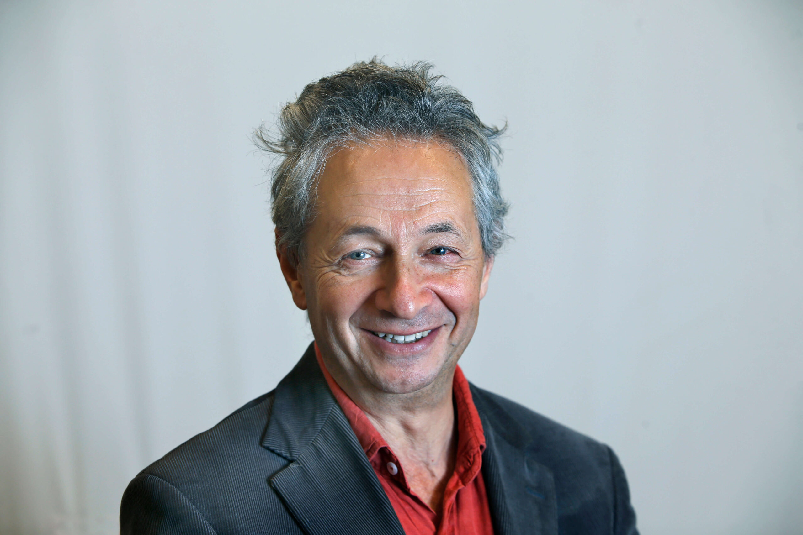 Dr John Boyle, Chair of Trustees. Portrait of Dr John Boyle, Chair of Trustees, against a white background.