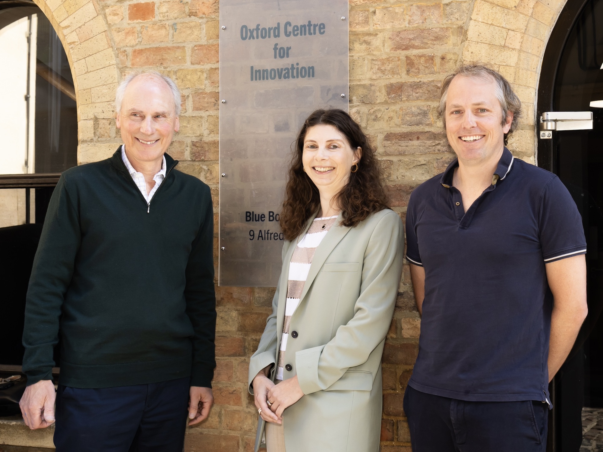 Newly elected trustees stand outside the Oxford Centre for Innovation.